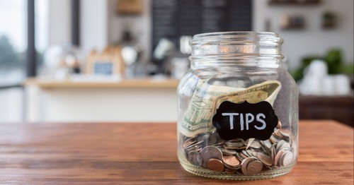 Agree or disagree: Tipping should be abolished, and all costs should be included in menu prices.